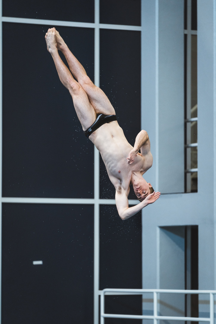 Jacob rotating through the air during a competitive dive