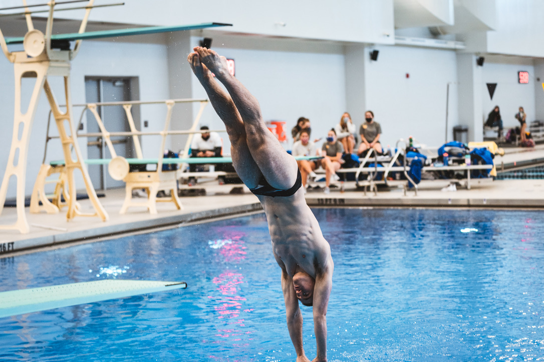 Jacob beginning a dive during a competition